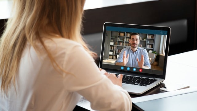 A candidate giving an interview to the woman