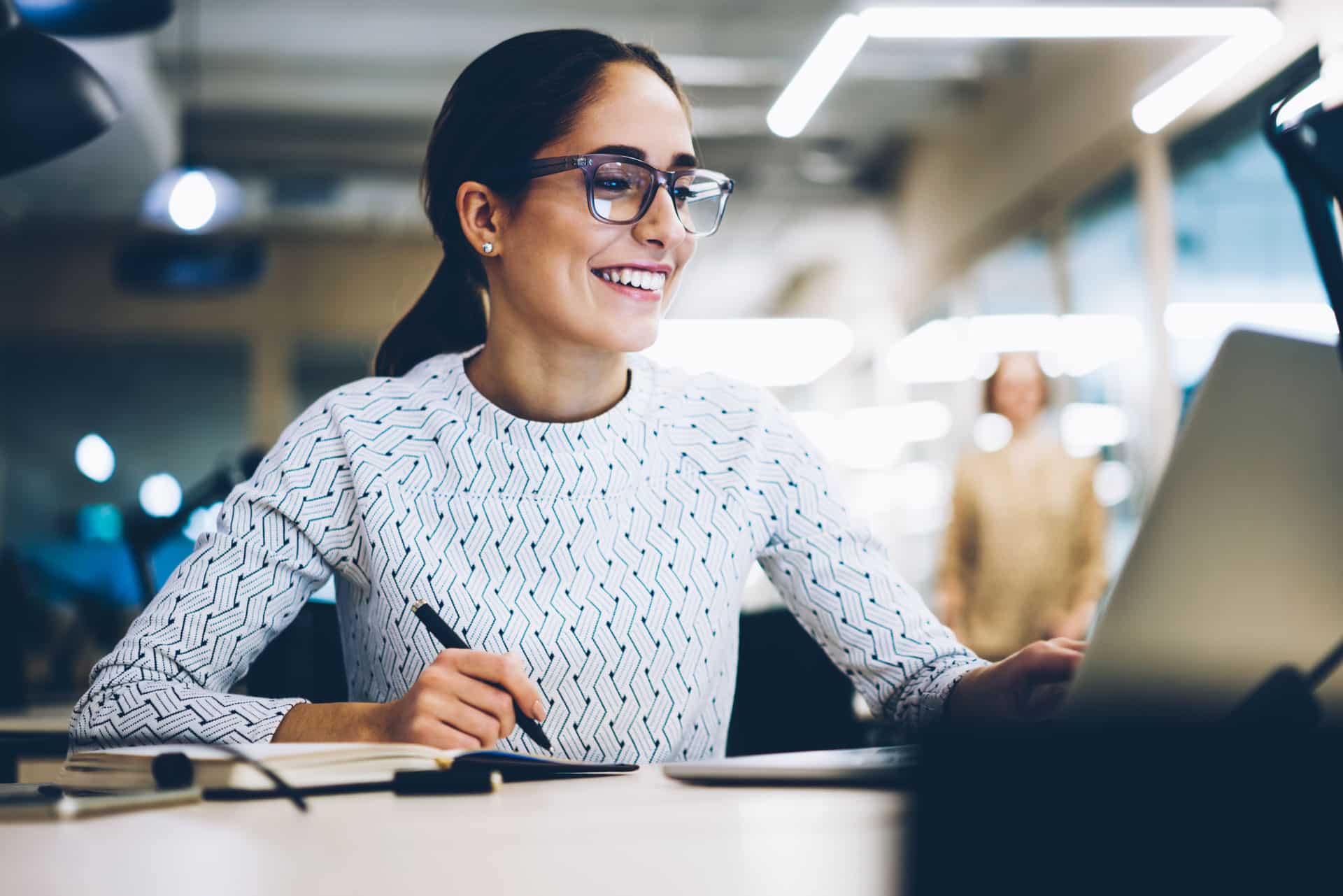 Cheerful businesswoman excited with accomplished project success