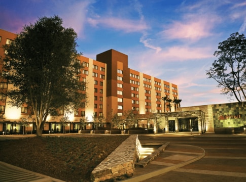 A building illuminated at dusk