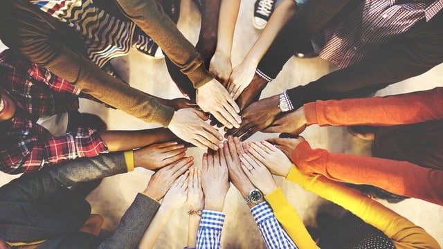 Multipple people hands