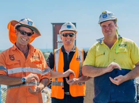 Construction workers posing for a phote