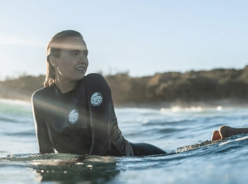 A lady on a surferboard