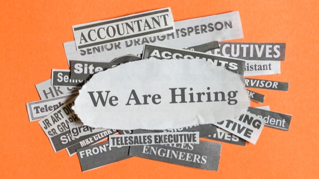We are hiring written with peices of paper