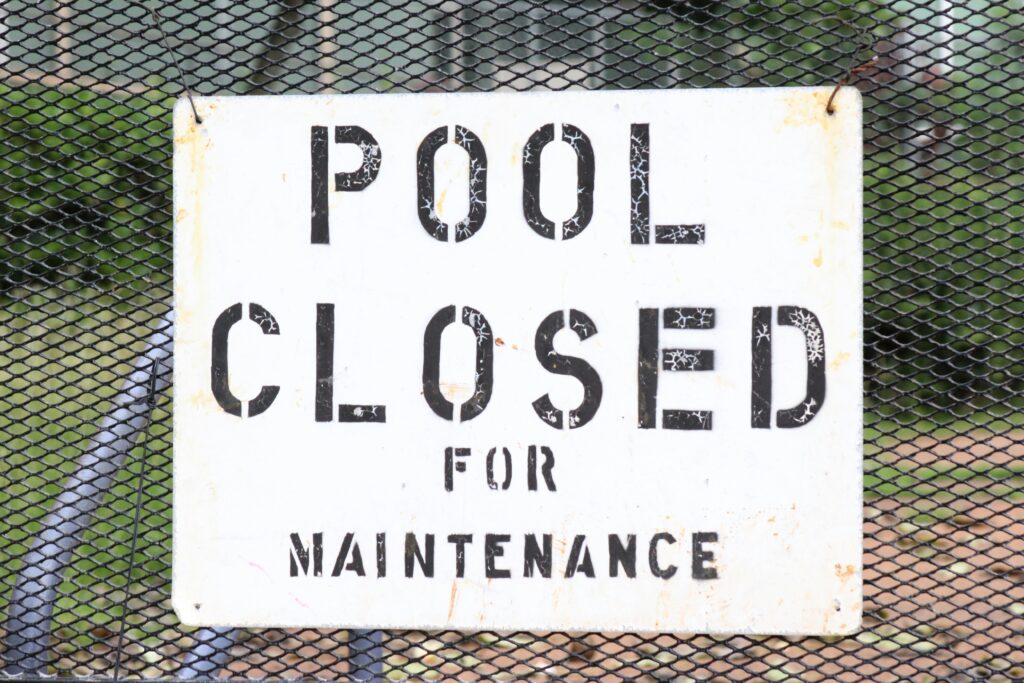 Pool closed written on a white board