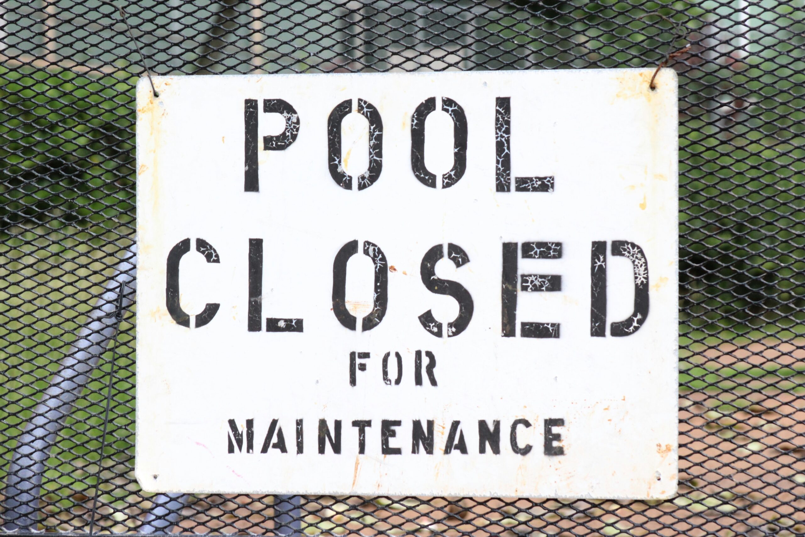Pool closed written on a white board